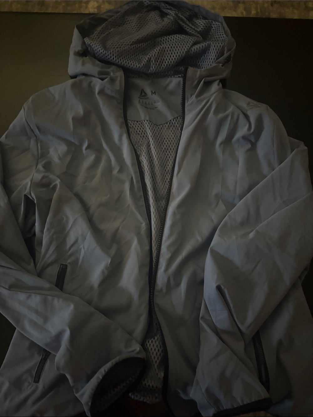 Reebok Unisex’s Light Gray Hooded Rain Jacket